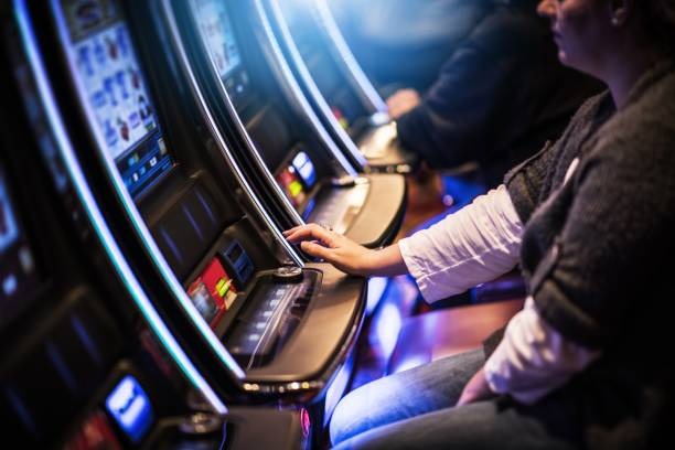 imbasslot live dealer blackjack table showing dealer, cards, and multiple player stations